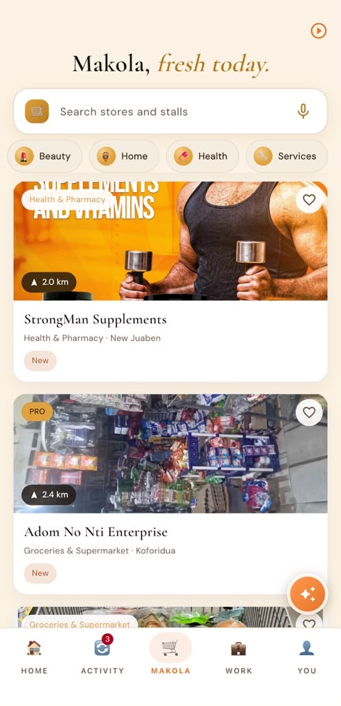 The FINDR local directory showing Makola stores and stalls with pictures and distances